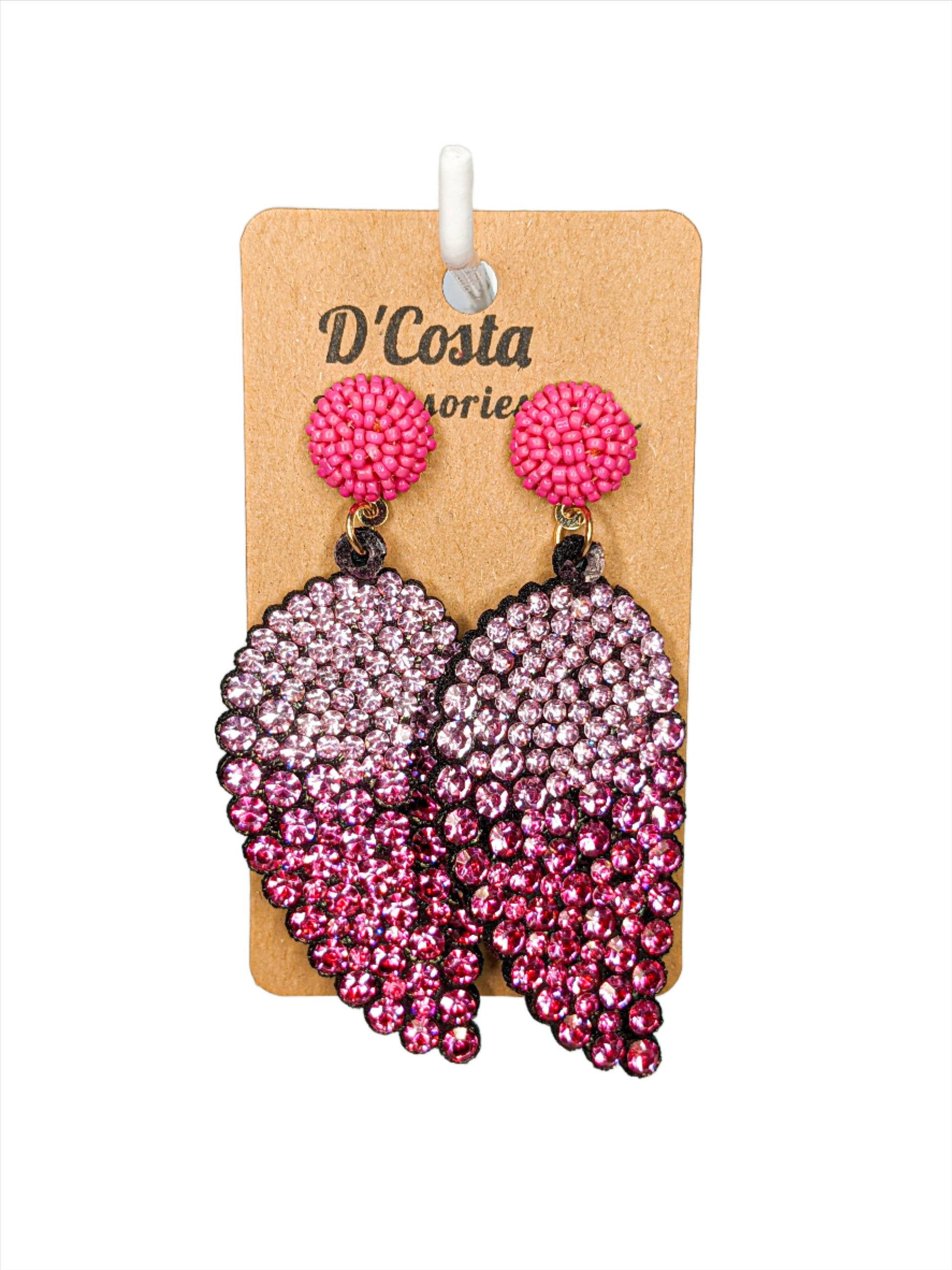 Leaf shaped statement drop earrings encrusted in pink diamante rhinestones.