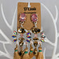 Beige and pink diamante rhinestone tassel statement drop earrings with gold tones