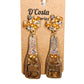 Brown, yellow and gold coloured rhinestone diamante champagne bottle statement earrings. Encrusted with pearlescent diamantes