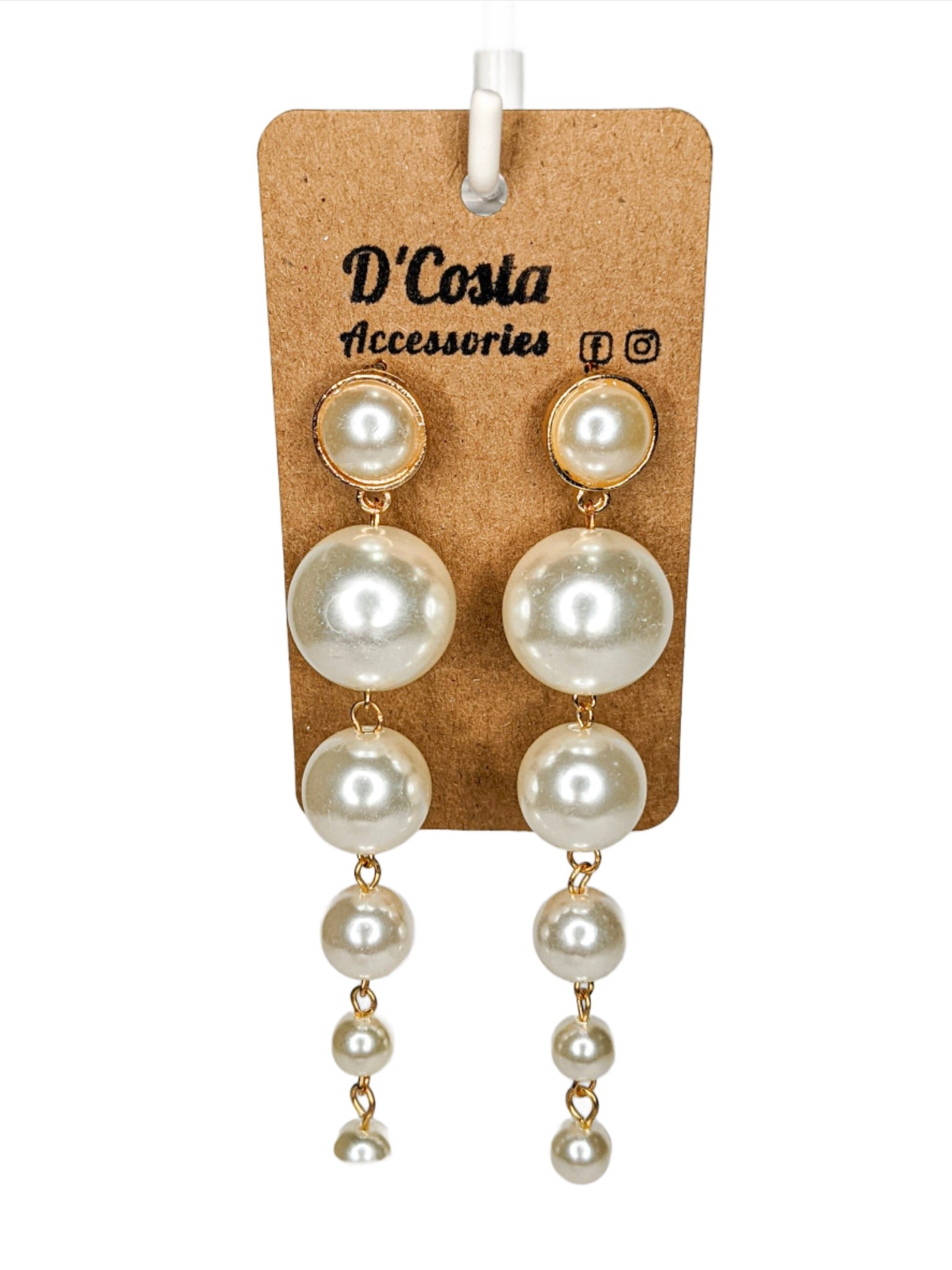 Large imitation pearl statement drop earrings set in gold tones