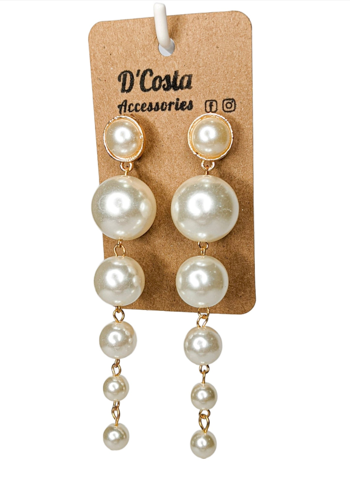 Large imitation pearl statement drop earrings set in gold tones