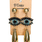 Large statement evil eye drop earrings, with black, blue and white diamantes and gold tones.