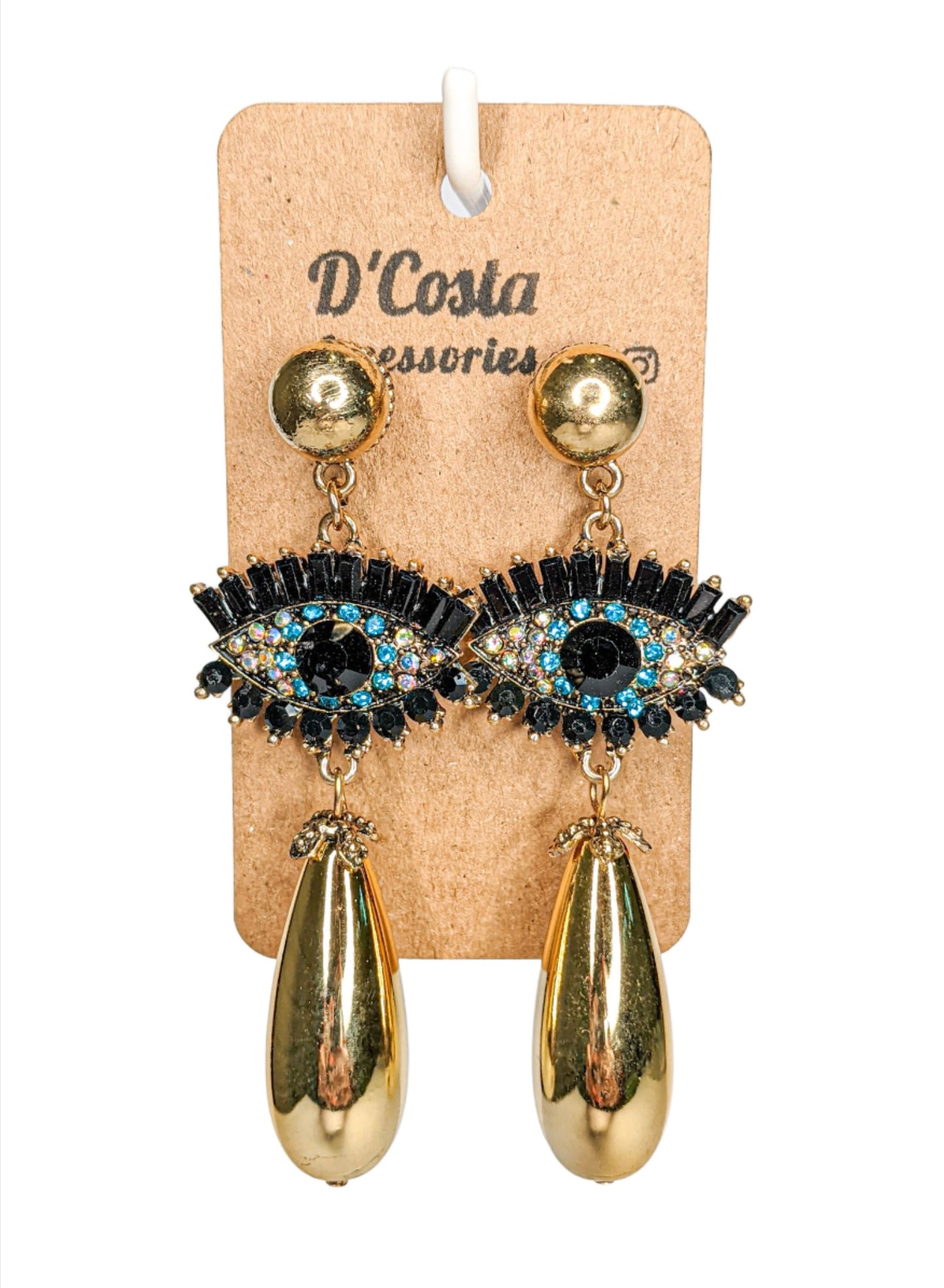 Large statement evil eye drop earrings, with black, blue and white diamantes and gold tones.