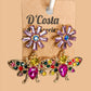 Statement bee and flower dangle earrings encrusted with colourful diamantes