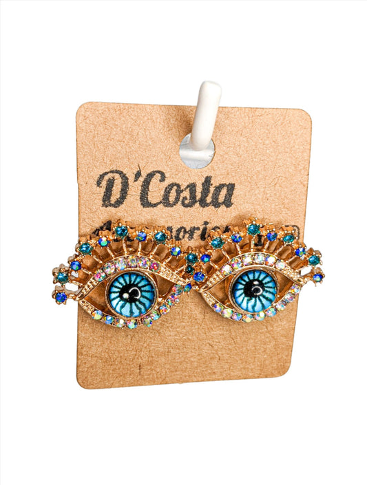 Evil eye statement stud earrings with blue and white pearlescent diamantes